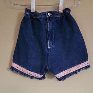Vintage denim shorts with ribbon trim